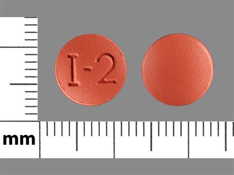 i 2 pill round brown|More.